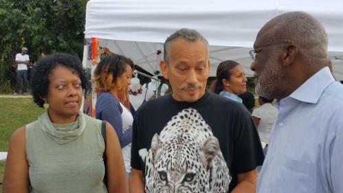 Dominica’s Ambassador Hubert John Charles chatting with members of the crowd